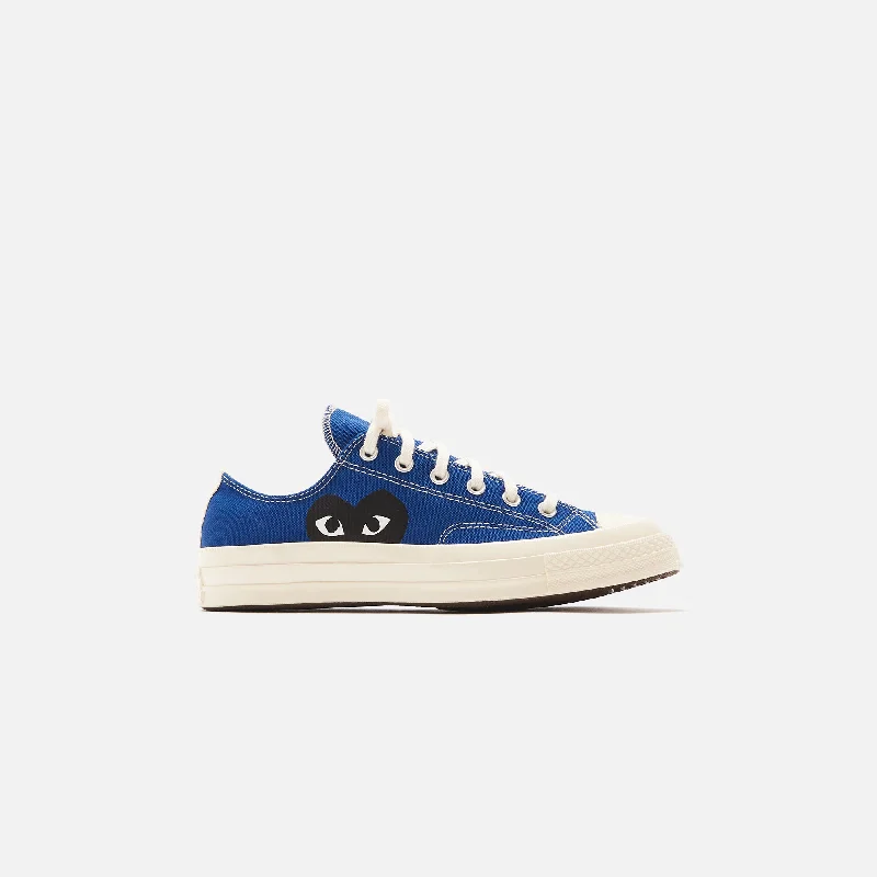 Men's fashion - forward sneakers with a unique tongue designCDG Pocket x Converse Chuck 70 - Ox Blue Quartz