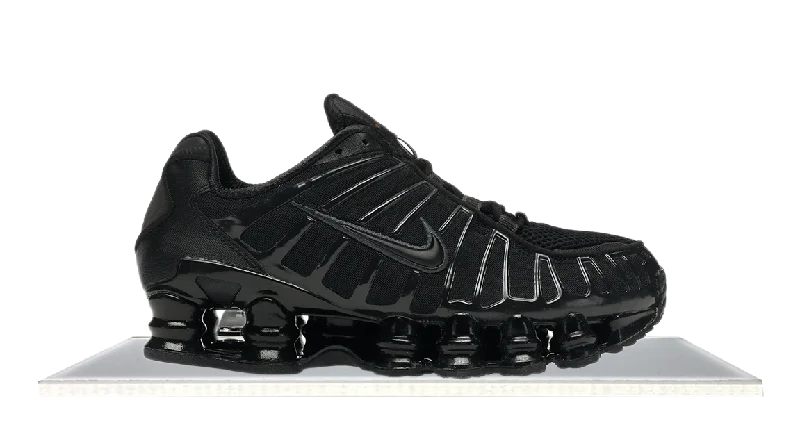 Men's soccer - inspired sneakers with a studded soleNike Shox TL Black Max Orange