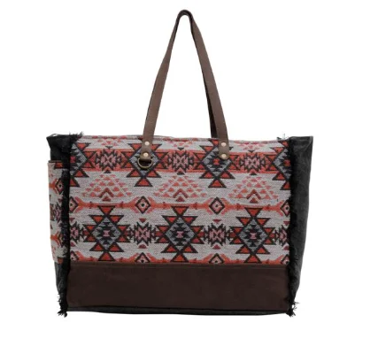 Men's western boots with a decorative inlay on the toe and heelMyra Maya Weekender Bag