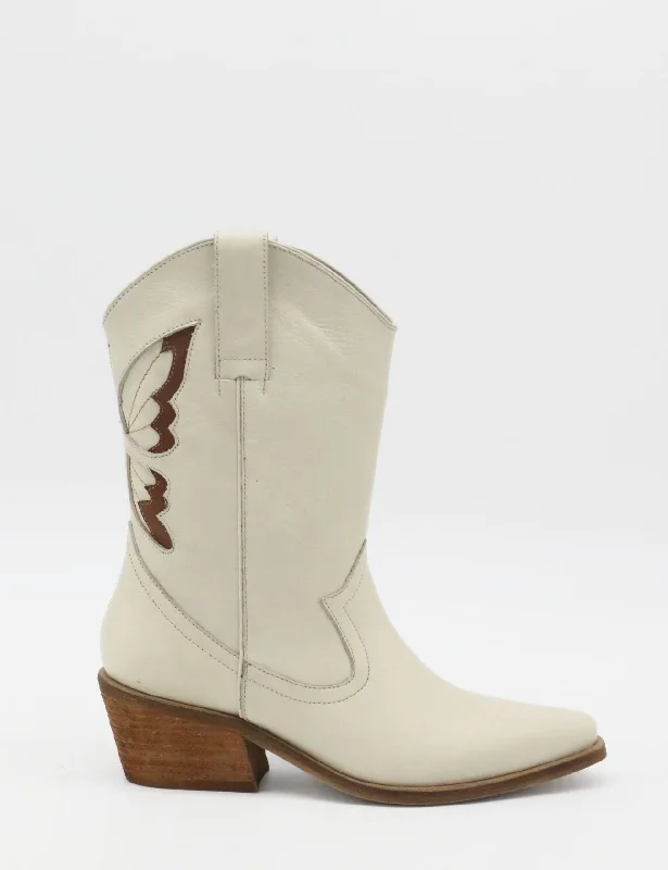 Men's western boots with a traditional western boot silhouette and a polished shineWoodstock western cowboy boots in off white leather womens shoes