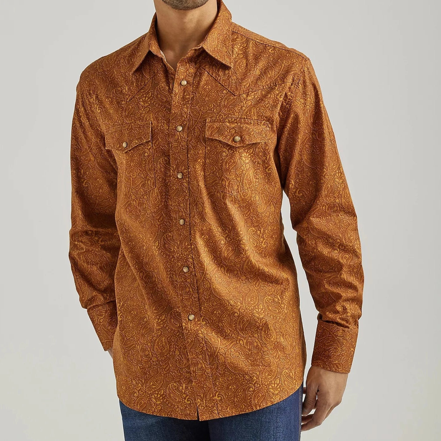 Men's western boots with a leather lining and a padded insoleWrangler Way Out West Men's Long Sleeve Western Snap Shirt in Raw Hide